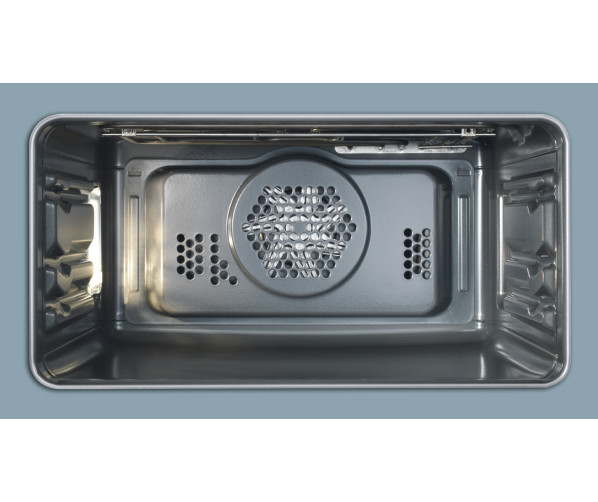 Grote brede binnen ruimte van de oven/magnetron 