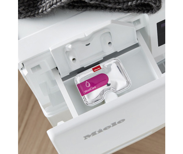 De WED675WPS heeft een CapDosing doseer systeem.