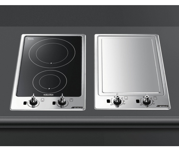 De Smeg PGF32I1 in een domino opstelling met andere domino kookplaten van SMEG