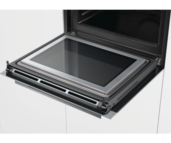 De ovendeur van de Siemens HM633GNS1 oven met magnetron