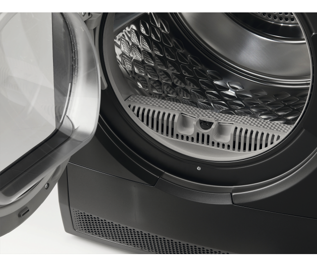 AEG TR868DS4 droger detailopname trommelbodem met pluizenfilter en onderpaneel ventilatie