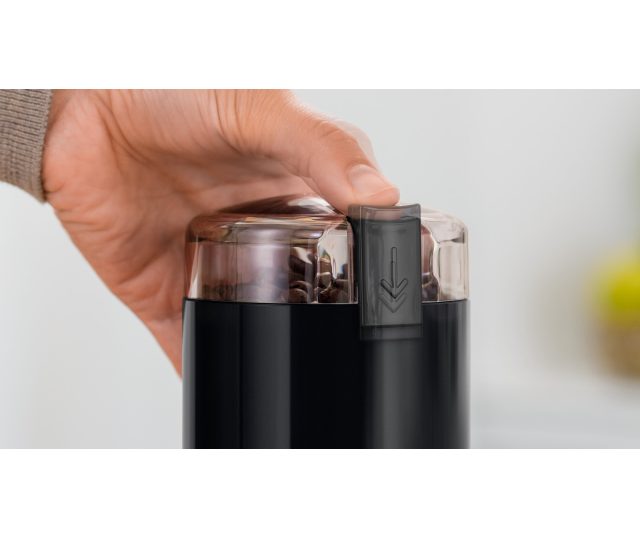 Bosch TSM6A013B koffiemolen detail doseerknop en handgreep onderaanzicht