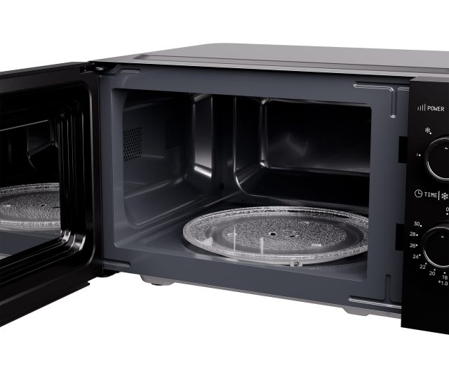 ETNA SMV720 magnetron interieur met geopende deur zijkant toont draaiplateau en ventilatie