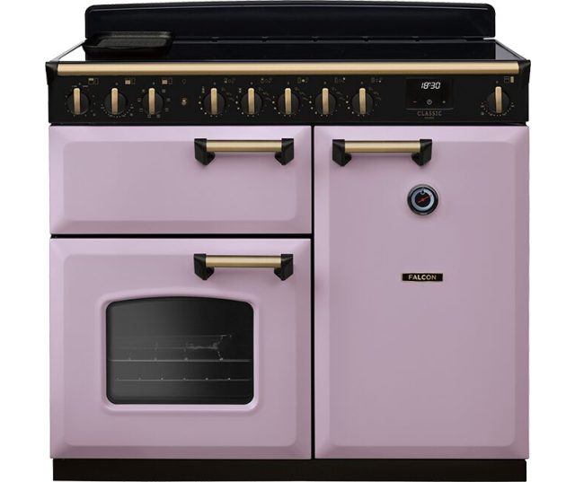 Falcon Classic Deluxe 100 inductiefornuis vooraanzicht in roze met zwart bedieningspaneel en twee ovens
