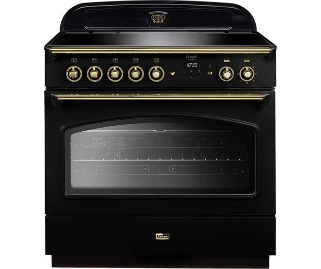 Falcon Classic FX 90 Inductie fornuis vooraanzicht in zwart met gouden bedieningselementen
