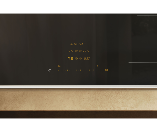 Miele KM 8482 FR inductiekookplaat bedieningspaneel detail met temperatuurweergave en regelknoppen