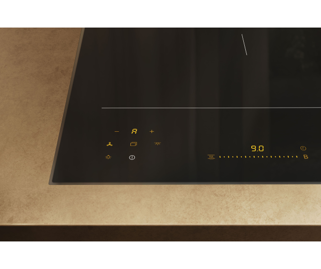 Miele KM8575FL inductiekookplaat in keuken geïnstalleerd, linkerzijde bedieningspaneel met symbolen en één actieve kookzone