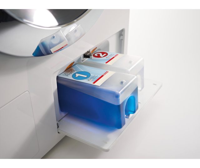 Onderin de Miele WKM 130 WPS bevindt zich het TwinDos systeem voor automatische dosering