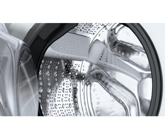 Siemens WG66B2ABNL wasmachine interieur trommel close-up met perforatiepatroon