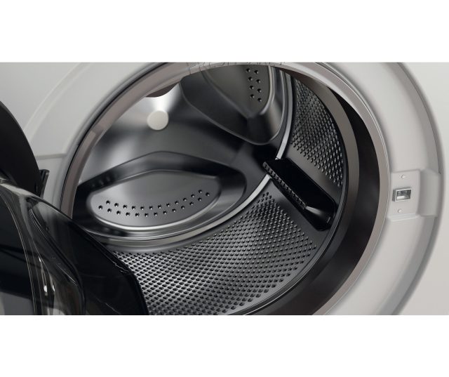 Whirlpool wasmachine trommeldetail met geperforeerde gaatpatroon en blokkeerelement