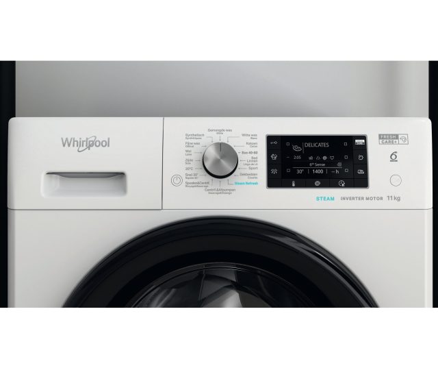 Whirlpool wasmachine bedieningspaneel detail met draaiknop en digitaal touchscreen