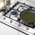 De Miele KM2010G heeft een sterkbrander linksvoor