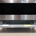 De opbergruimte onder de oven van het Smeg C9CIMX9 inductie fornuis