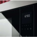 AEG NMS5G25IEM inbouw magnetron met grill frontpaneel licht scherpgesteld op touchbediening en klokdisplay