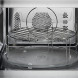 AEG OS5CM34MB inbouw magnetron combi interieur detailopname van grillrooster met poten geplaatst op het glazen draaiplateau