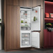 Ingebouwde AEG TC9MS181AC in houten keuken met beide deuren geopend