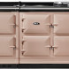 Aga eR7i1505ERIO fornuis vooraanzicht met zes ovens in beige, zwart bovenblad en kookvlak