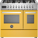 Bertazzoni PRO96L2EGIT2 fornuis vooraanzicht, geel met twee ovens, zes gasvlammen bovenblad en bedieningspaneel