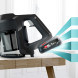 Bosch BBS611BSC gebruiksscenes met vrouwen vacuümen in woonkamer en trap