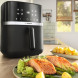 Bosch MAFS2462B airfryer in keukenomgeving met bereide zalm en groenten op borden