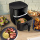 Bosch MAFS2462B airfryer geopend met bereide maaltijden en diverse gerechten eromheen