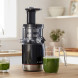 Bosch MESM731M slow juicer in keuken op aanrecht in bedrijf met vers sap