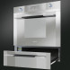 De CT15-2 warmhoudlade van SMEG kan eenvoudig onder een 45 cm. inbouw apparaat uit dezelfde Linea Luce lijn geplaatst worden.