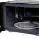 ETNA SMV720 magnetron interieur met geopende deur zijkant toont draaiplateau en ventilatie