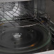 Exquisit EMW2546HI magnetron combi vooraanzicht gesloten deur in inbouwkast