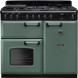 Falcon Classic Deluxe 2026 100 Gas fornuis, vooraanzicht in saliegroen met zwarte bedieningspaneel en dubbele ovens