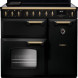 Falcon CLDL90EIPGBL/AB_E1 fornuis vooraanzicht met zwarte behuizing, gouden bedieningsknoppen en dubbele oven