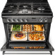 Falcon Classic 90 FXDFSB oven geopend met 2 niveaus en verschillende gerechten erin