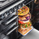 Falcon Deluxe 1000 gasfornuis open oven met geopende deur en gegrilde voedsel