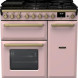 Falcon Estel Deluxe 90 Gas in lichtroze, vooraanzicht met gasfornuis, twee ovens en grepen