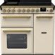 Falcon Estel Deluxe 90 Inductie fornuis vooraanzicht met inductiekookplaat, bedieningsknoppen en twee ovens in crème-zwart design