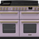 Falcon Estel Deluxe 110 fornuis vooraanzicht in lila met zwart kookoppervlak, dubbele ovens en bedieningsknoppen