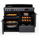Falcon Estel Deluxe 110 met beide ovendeuren geopend, linker oven met groentegerecht en rechter oven met muffins