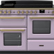 Falcon Estel Deluxe 110 Inductie vooraanzicht in roze met dubbele ovens en inductiekookplaat