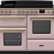 Falcon Estel Deluxe 110 Inductie vooraanzicht roze met twee ovens en inductiekookplaat