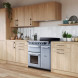 Falcon Estel Deluxe 100 Inductie fornuis ingebouwd in keuken met houten kasten en witte tegels