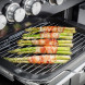 Falcon Nexus SE 110 Gas fornuis, geopende gaskookplaat met bacon-gerilde asperges