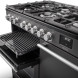 Falcon NEX100DFPWHT/CM_E1 gasfornuis bovenaanzicht met uitklapbare grillplaat en zes branders