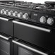 Falcon NEXUS NEXB110DFPGBL/CM_E1 fornuis zwart zij-/hoekzicht met geopende ovendeuren en handgrepen