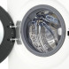 LG F4X5009TWB frontlader wasmachine, geopende deur detail met trommel en perforatiecircuits