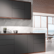 Miele DAZ 1620 afzuikap ingebouwd in moderne zwarte keuken, gesloten deur, minimalistisch design