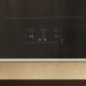 Miele KM 8684 FR inductiekookplaat bedieningspaneel met touch-controls en timer in close-up