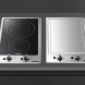 De Smeg PGF32I1 in een domino opstelling met andere domino kookplaten van SMEG