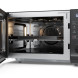 Sharp YC-GC52BE-B magnetron open met uitschuifbare draaitafel en verwarmingscircuit zichtbaar