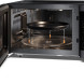 Sharp YC-MC422AE magnetron met geopende deur, draaischijf en grill-element zichtbaar in interieur