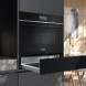 Siemens BI710C1B1 compacte oven met magnetron, geopende warmhoudlade onder magnetronkamer
